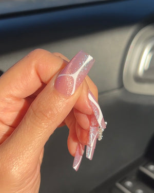 Cateye With White Swirl Nails