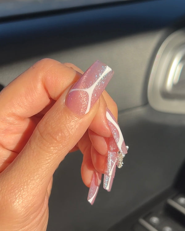 Cateye With White Swirl Nails