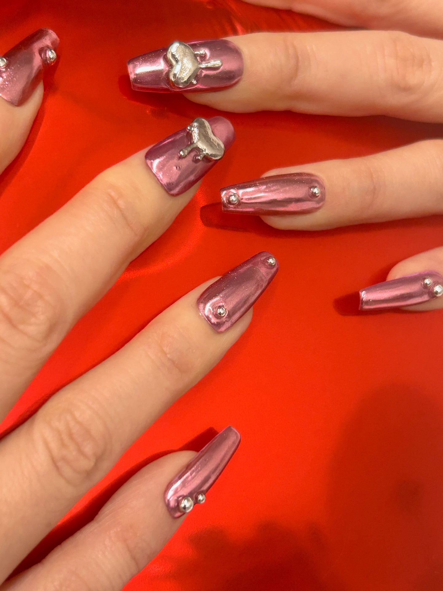 Pink Chrome Heart Nails